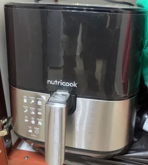 Nutricook Air fryer (Used)  life smile nonstick pots (New)  Shoe Cabinet (Used) - All for AED 250