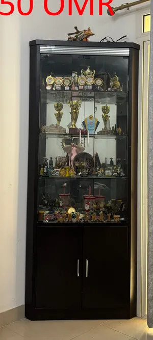 HomeCenter Glass corner showcase with storage