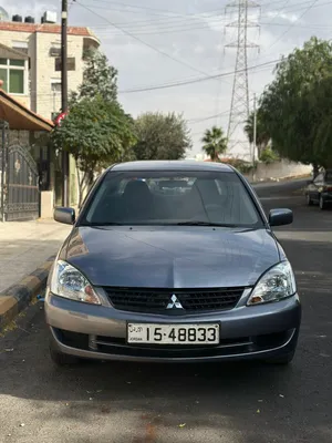 متسوبيشي لانسر 2007 دفعه اولى 1500 وقسط شهري 150 اقساط عن طريق المعرض