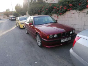 لون خمري  BMW E34 1993