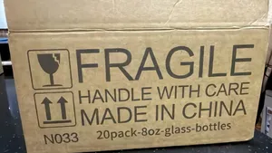 Seventeen 18 Ounce Glass Bottles