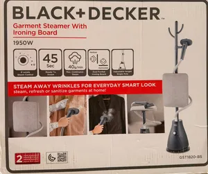 Garment steamer with ironing board. Black + Decker. Good quality. Just like new. Green.