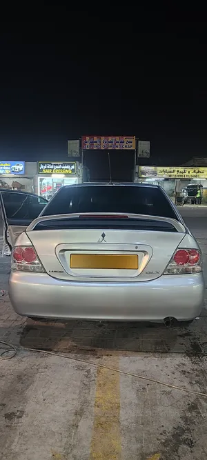ميتسوبيشي لانسر 2007 موديل خليجي بجميلة فضي مع أنظمة أمان ومواصفات حديثة