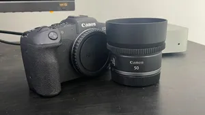 Canon EOS RP ( full frame ) + 50mm 1.8 lens with 2 original batteries