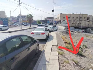 قطعة أرض تجارية بجانب مستشفى الأمير فيصل شارع ياحوز مساحتها دونم ونص على 3 شوارع