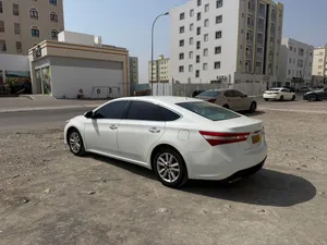 تويوتا أفالون 2014 XLE مرخصة بحالة جيدة مع مواصفات أمريكية ونظام أمان متكامل