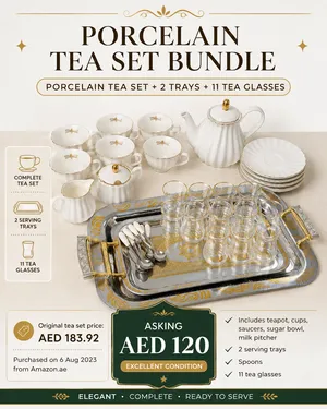 tea set, trays, extra glas tea cups, sugar bowl and milk , spoons