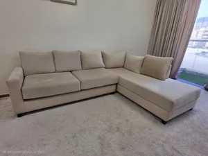 Beige L-shaped Sofa - Comfortable 3-seater with Chaise (Good Condition)