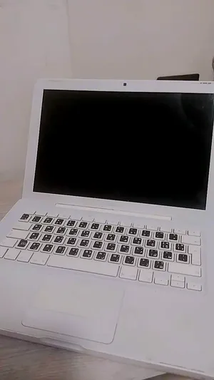 MacBook White  بحالة ممتازة  شاحن أصلي + ماوس  2500ج