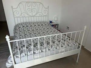 white metal bed frame ( matress not included)