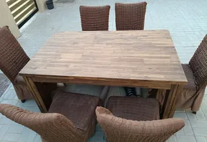 United furniture Solid wood table with 6 brown covered chairs