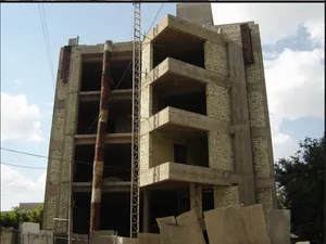 عمارة سكني تجاري كرادة داخل قريب ابو نؤاس