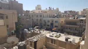 عماره - وسط السوق - شارع بغداد - الزرقاء - 5 طوابق - مصعد