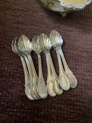 ثمان ملاعق مطلية فضة