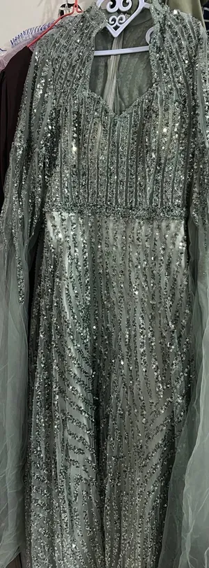 فستان زواج فخَم جدا لونه أخضر ساج-sage green مقاس  L - XL
