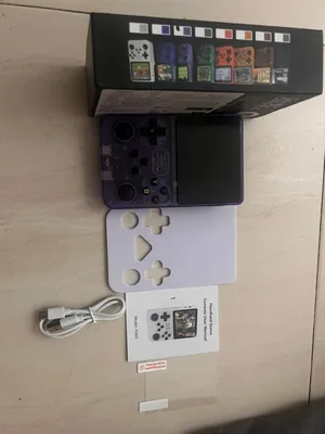 R36S retroid ( new ) with thousands of games.