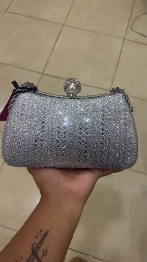 Two purses silver for wedding could be for your normal use