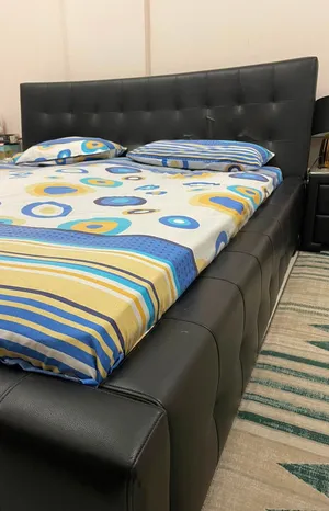 Black leather bedroom set