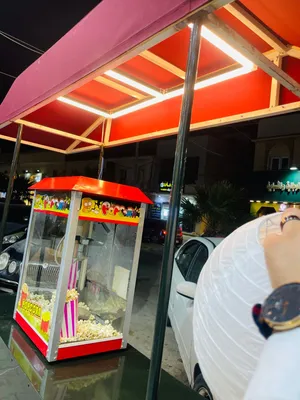 عربة فشار وحلوى وكل شي للبيع