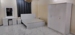 Bed with mattress and cupboard available.