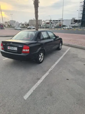 Mazda 323 m 2004  بحالة ممتازة جداً