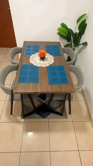 Branded Dining Table with 4 Chairs – Like New