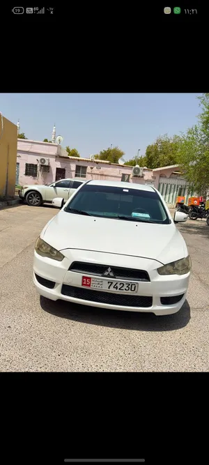 لانسر 2015 للبيع العين. المدينه