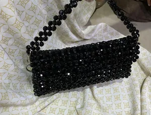 شنطة يدويه نسائيه اسود(هاندميد)