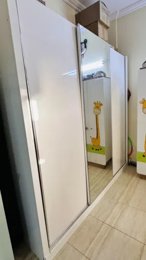 For Sale: Stylish White Cupboard with Mirrored Doors
