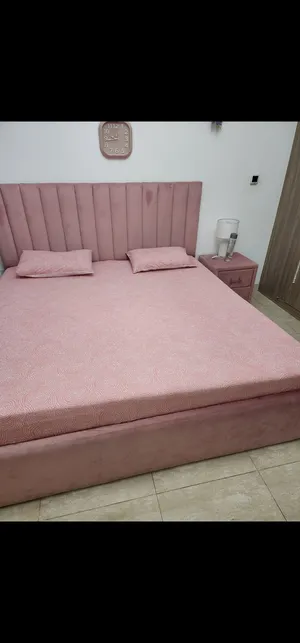 King size bed with mattress and side table