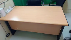 three office chairs and One office table with two drawers