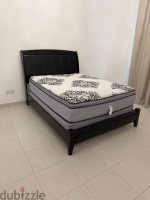 Queen size Mattress with bed frame and side table for sale