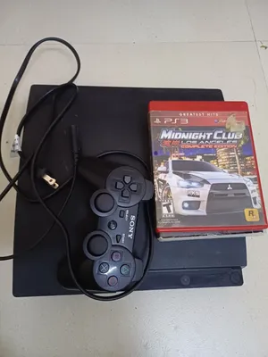 PlayStation 3 slim with 3 games
