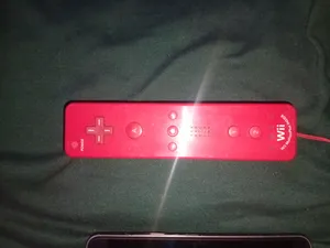 يد تحكم نينتندو وي ريموت بلس أصلية (Wii Remote Plus) لون أحمر مميز