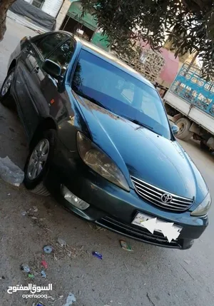 تويوتا كامري 2006 موديل XLE بترولي مرخصة بمواصفات خليجية مع أنوار نهارية