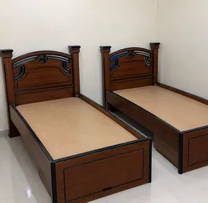 2- wooden single beds.