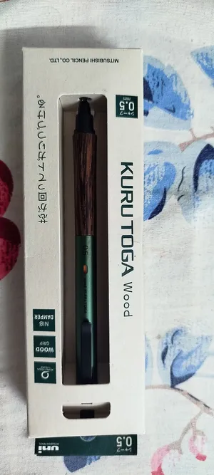 قلم Uni Kuru Toga Wood, 0.5mm Mechanical Pencil, Auto Lead Rotation, Wooden Grip and Metal Body, For