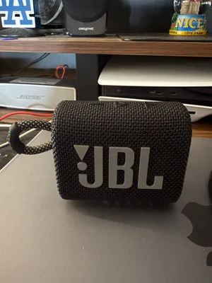 JBL GO3 mini speaker clean and no damage. Sounds like new.
