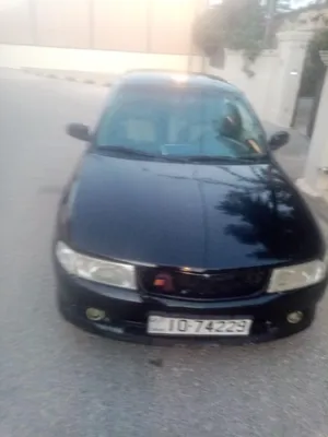 ميتسوبيشي لانسر 1999 GLX مستعمل بمواصفات يابانية وأسود مع تأمين إلزامي