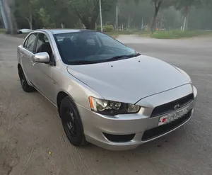 Lancer 2015 model Good condition Passing 04/2027 Full automatic Ac ok Gear ok