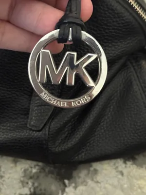 100% Authentic Michael Kors Black Pebbled Leather Handbag with MK Logo Charm & Long Strap