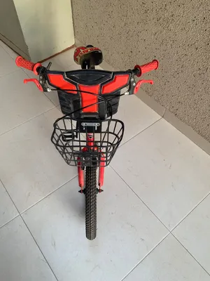 Kids bicycle- Weilaixi- with training wheels and basket side rollers