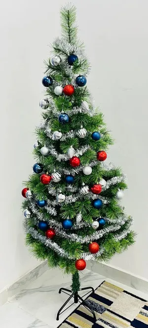 Christmas Tree with 45 Decorating Items for Sale for Travel Purposes