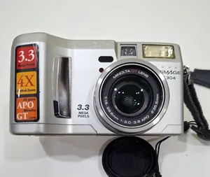 للبيع: كاميرا Minolta DiMAGE S304 كاميرا رقمية كلاسيكية من Minolta بحالة جيدة.