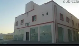 للبيع بناية تجارية في مسقط العامرات النهضة البريد جنب المحكمة مكونة من طابقين مؤجرة بالكامل