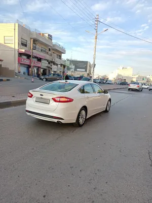فورد فيوجن ES 2013 فل الفل بحالة الوكاله للبيع بسعر 10400 ماتور 2000cc هايبرد قوي جدا واقتصادي جي