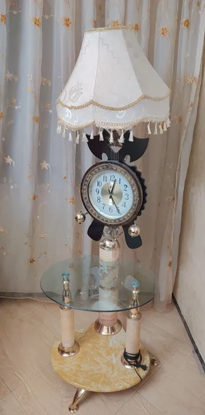 ساعة مع طاولة وتابلام للصالونات وغرف الجلوس