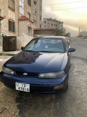 كيا سيفيا 1995 صالون / سيدان كحلي مستعملة مع جنوط وتكييف