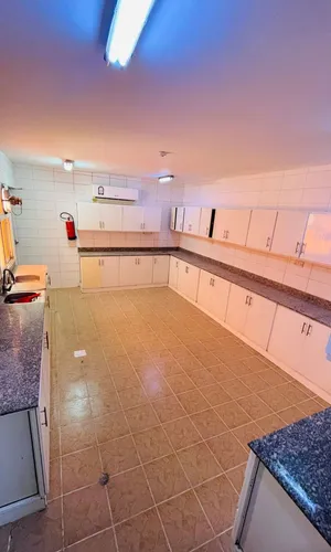 سكن عمال 64 غرفة واسعة  في أبو نخلة.