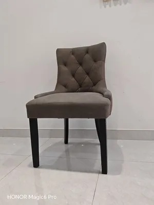 Dinning chairs cussioned 6pcs with protecting covers, and only OMR 18/-